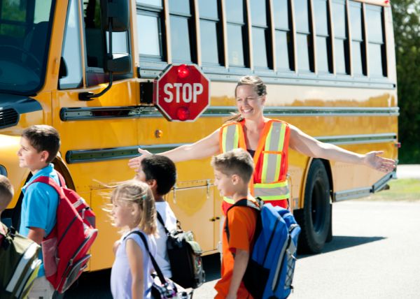 What Are the Consequences if You Fail to Stop for a School Bus with Flashing Red Lights?